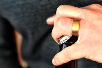 Opening a Beer Bottle with a Wedding Ring
